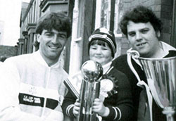 Kevin Ratcliffe with Cyril Lellos' son and grandson on Goodison Avenue in 1985