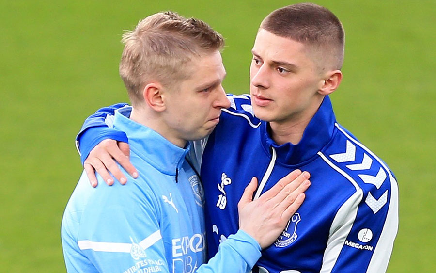 Mykolenko and Zinchenko embrace before Everton vs Manchester City