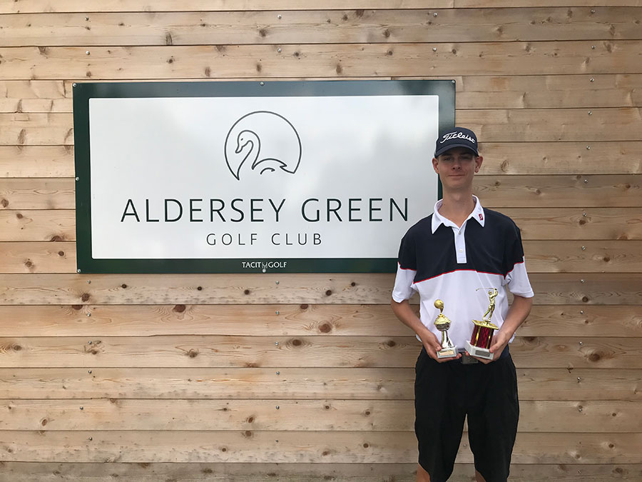 Dan Harding with his two trophies from the day