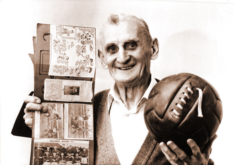 Bob Bell with ball and scrapbook