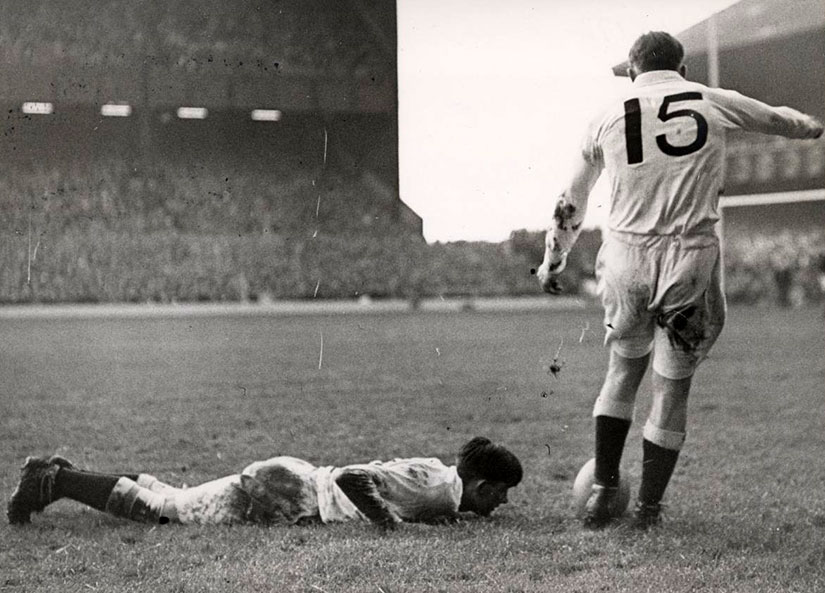 Dick Uren kicks to convert for England in 1950