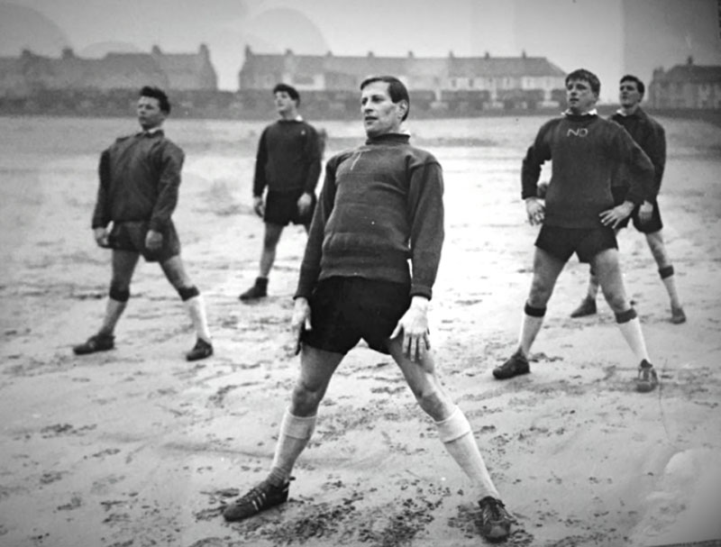 Eddie Thomas training on the beach with Swansea
