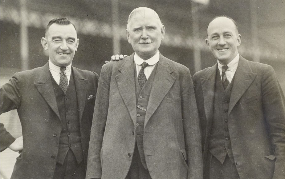 Hunter Hart and Theo Kelly with a director, mid-1930s