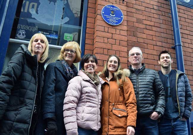 Dave Bond; the son of Norman Greenhalgh looks up at the plaque